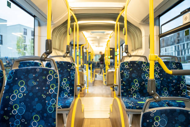 istock Modern empty urban bus aisle interior with no people inside 1458349586