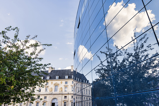 detail of an abstract polygonal facade of a contemporary office building