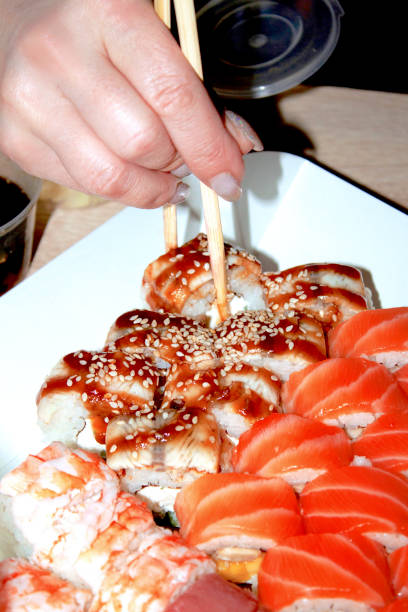istock Delicious beautiful sushi with seafood and rice 1458351263