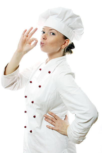 istock Happy attractive cook woman over white background 145835456