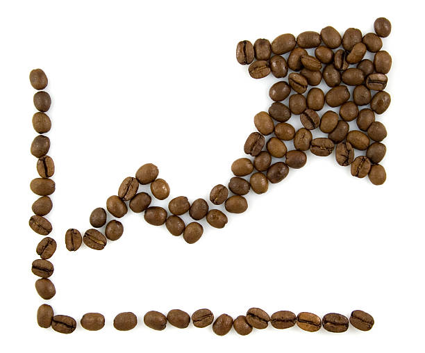Coffee beans arranged as a progress graph stock photo