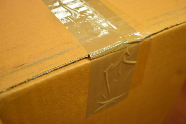 istock brown box packaging for shipping, paper textured 1458364484