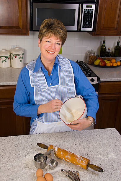 Woman Baking in the Kitchen stock photo