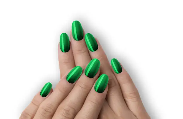 Trendy green color manicure design on a beautiful white background