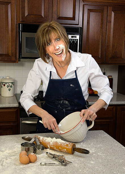 Woman Baking in the Kitchen stock photo