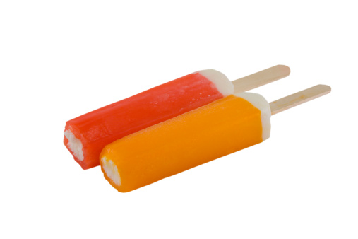 red and orange ice cream filled popsicles  on  white