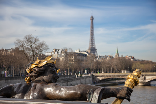 Paris, France -November 2017 , place des Pyramides a golden statue of Jeanne d'Arc on the back of her horse also gold covered