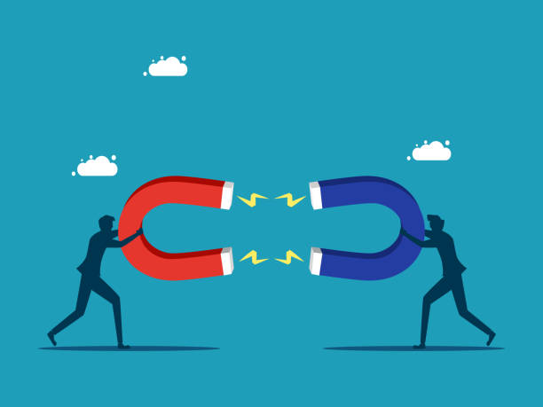 istock Two businessmen attract each other. Tuning together for business 1458372195