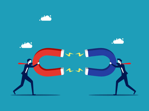 istock Two businessmen attract each other. Tuning together for business 1458372261