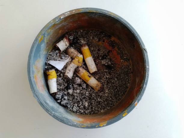 istock Cigarette butts and ashes in the ashtray 1458374519