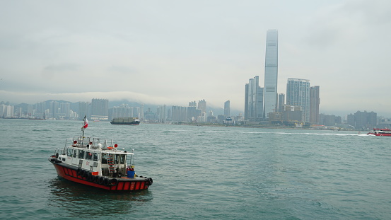 VICTORIA HARBOUR, HONG KONG - SEPT 9, 2013 - Hong Kong's Star Ferry crossing Victoria Harbour.