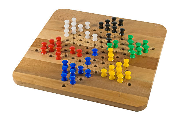 Red's Turn Chinese Checkers board on white with game in progress chinese checkers stock pictures, royalty-free photos & images