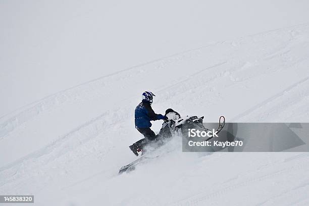 Extreme Snowmobiling On Mountain Stock Photo - Download Image Now - Adult, Adults Only, Adventure