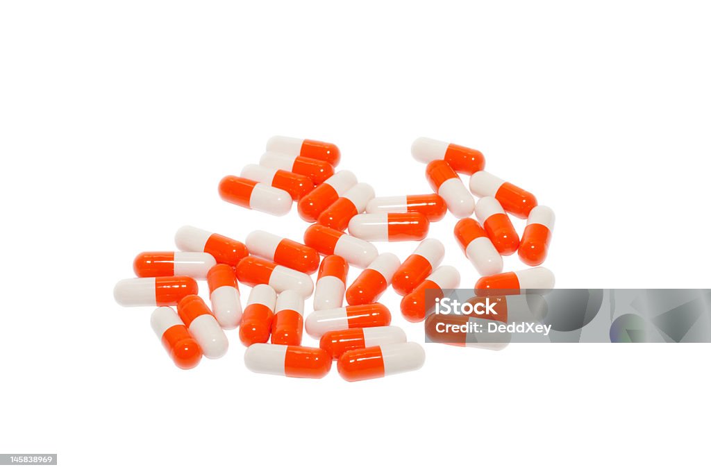 Pílulas branco-laranja - Foto de stock de Antibiotico royalty-free
