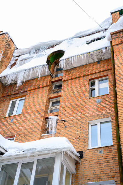 istock Close-up of icicles on the roof. 1458393943