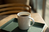 A cup of hot americano in winter