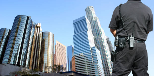 Security agent surveillance Security agent watching downtown area safe guard stock pictures, royalty-free photos & images