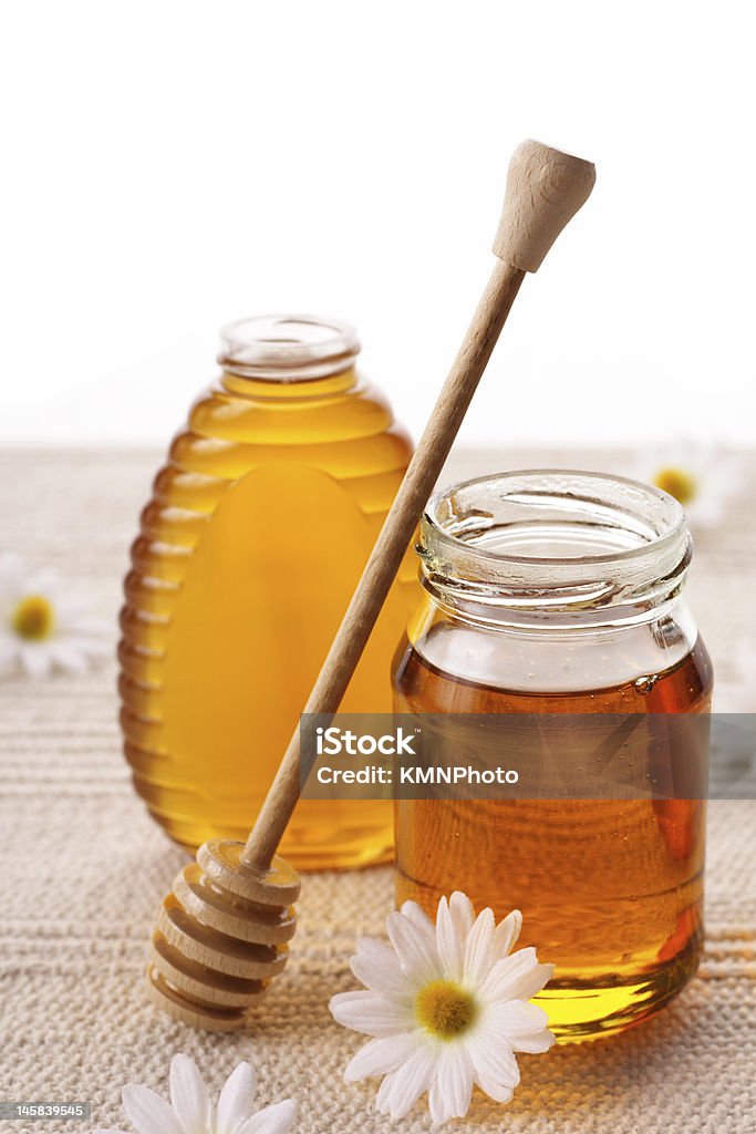 Honey flowery honey, sweet food, healthy eatig, food ingredients, honey dipper Chamomile Plant Stock Photo