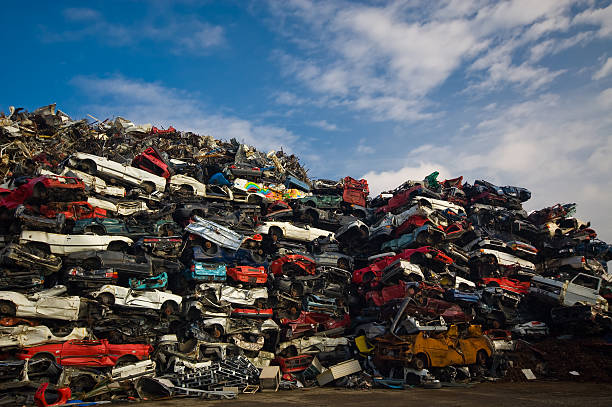 pile of used cars stock photo