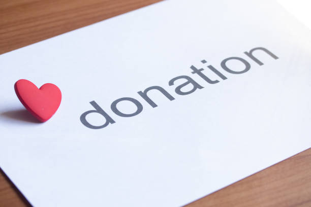 istock Red heart and donation. Heart donation concept. 1458410018