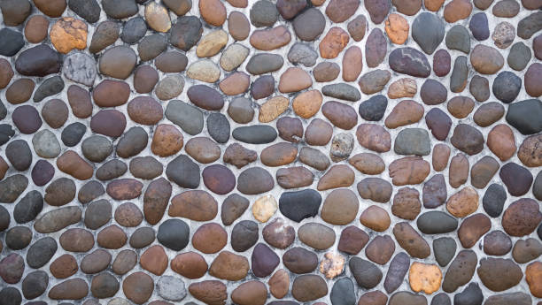 istock Pebble Pattern Texture Background,Light Nature on Vintage Construction House Wall Interior Room 1458414238