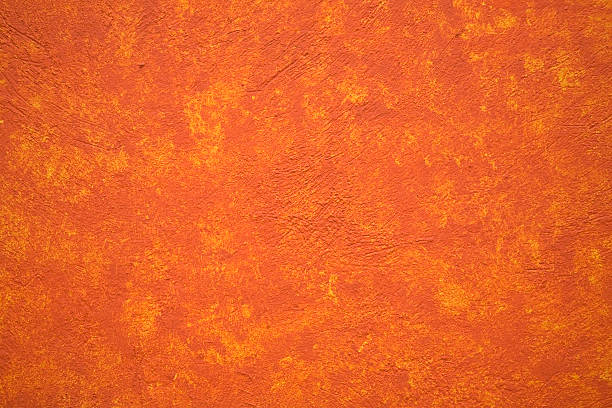 lumineuse et animée orange brique mur jaune mexique - orange wall photos et images de collection