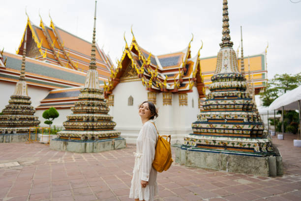 istock Woman exploring  Wat Pho in Bangkok 1458414714