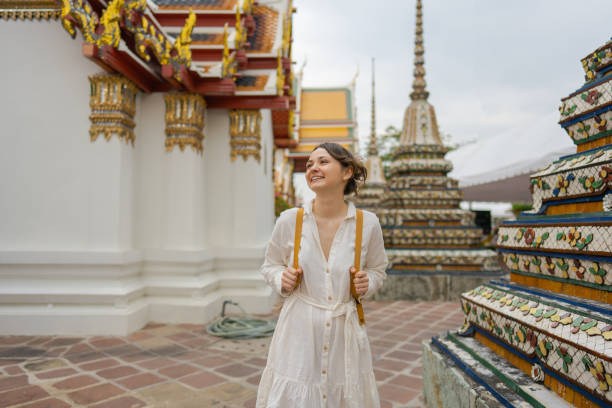 istock Woman exploring  Wat Pho in Bangkok 1458414719