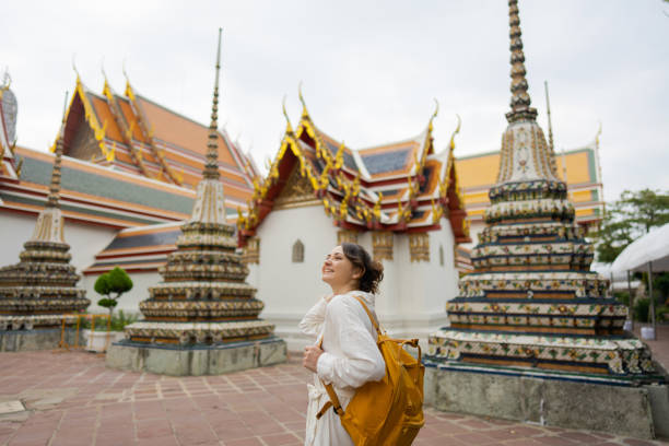 istock Woman exploring  Wat Pho in Bangkok 1458414722