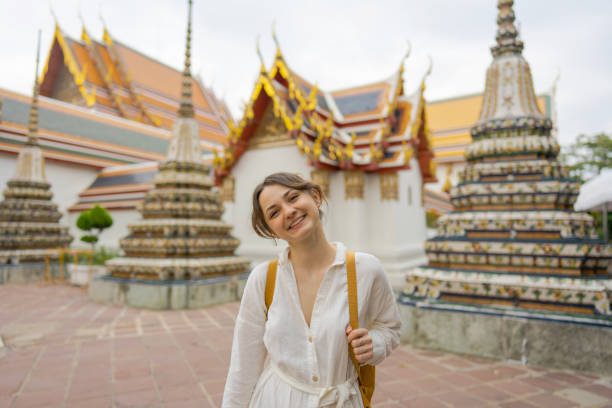 istock Woman exploring  Wat Pho in Bangkok 1458414723