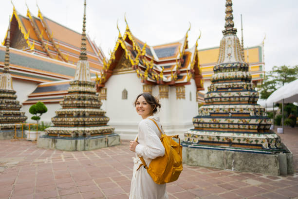 istock Woman exploring  Wat Pho in Bangkok 1458414725