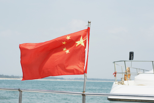 China flag on a jet boat on the ocean