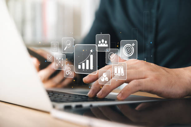 istock concept of long-term business development and management Executives looking at virtual screens business graph icon Goal setting, problem-solving, workflows, optimal business operations and innovation. 1458418234