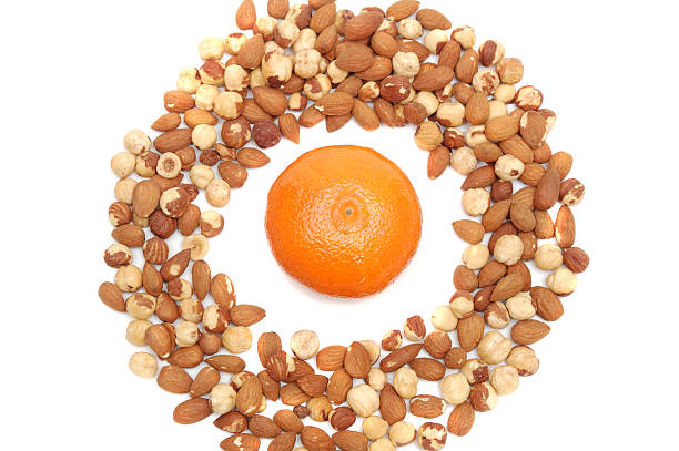 istock mandarin in center of nuts ring 145842181