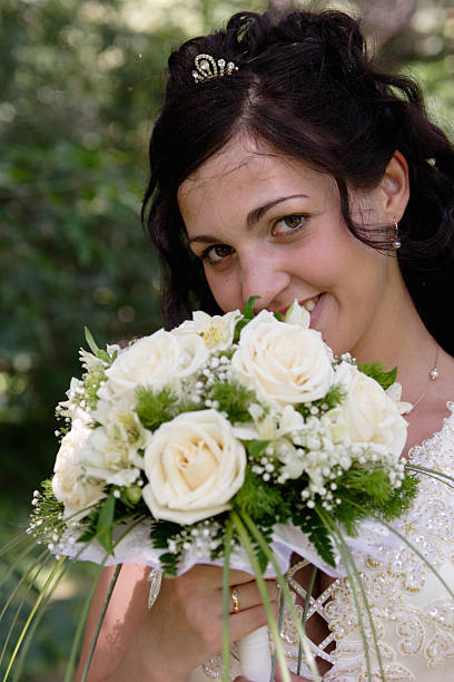 istock Bride with a bunch of flowers 145842212