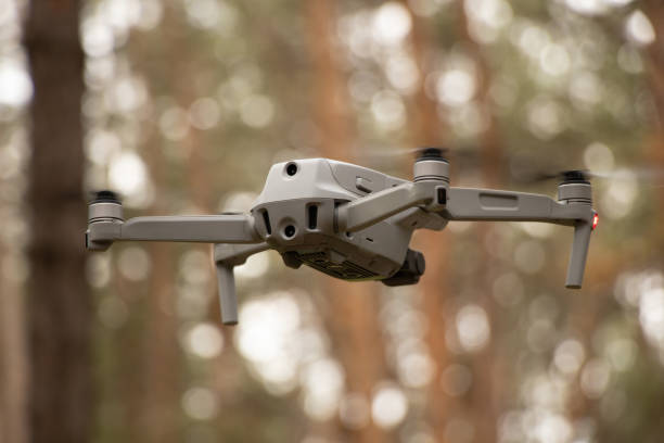 istock drone in flight in the forest close up, drone 1458423460