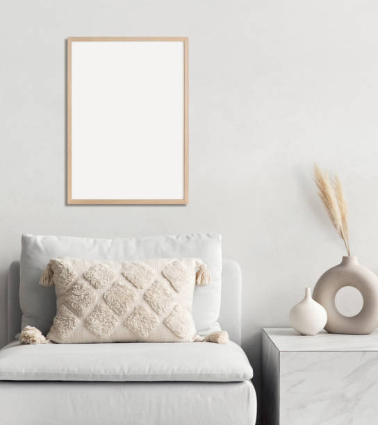 istock Artwork mockup in interior design. Blank picture frame on a wall. Vertical orientation 1458423477