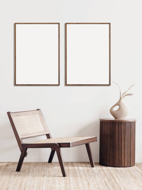 istock Two artwork mockups in interior design. Blank picture frames on a wall. Vertical orientation 1458423526