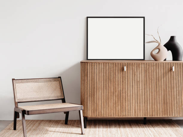 istock Artwork mockup in interior design. Blank picture frame on a wall. Horizontal orientation 1458423527