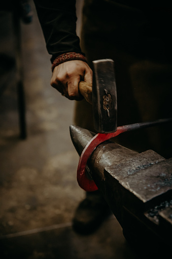 Close up of hammer on anvil at workshop