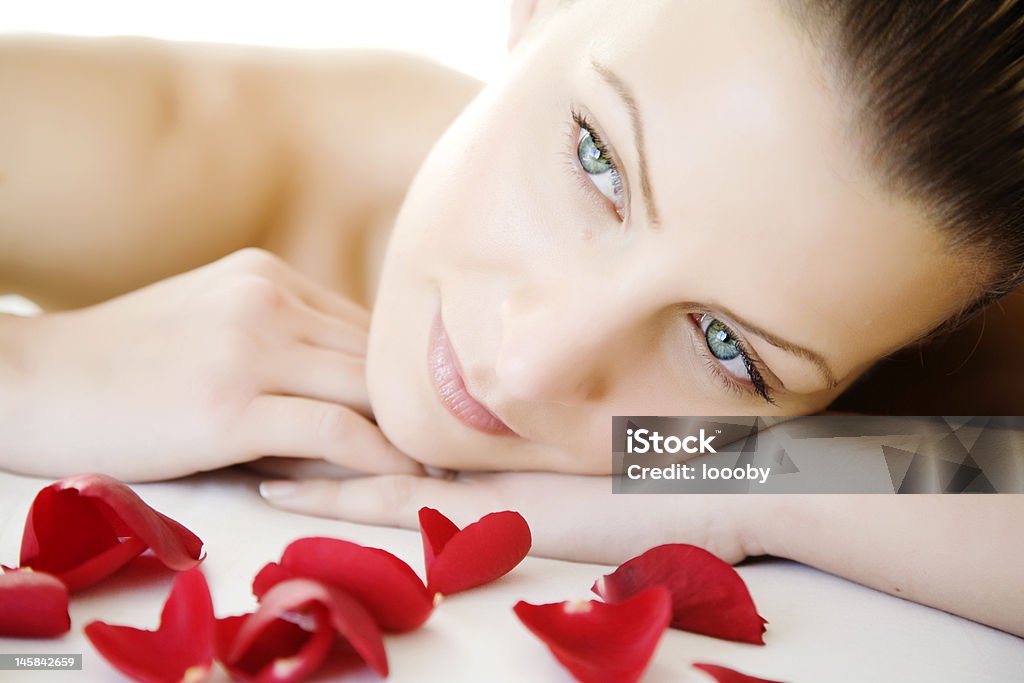 beauty closeup of young beautiful female face, lying on a bed, maybe enjoying a beauty-treatment. 20-29 Years Stock Photo