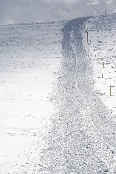 Cтоковое фото Крупный план снег track после Грумер