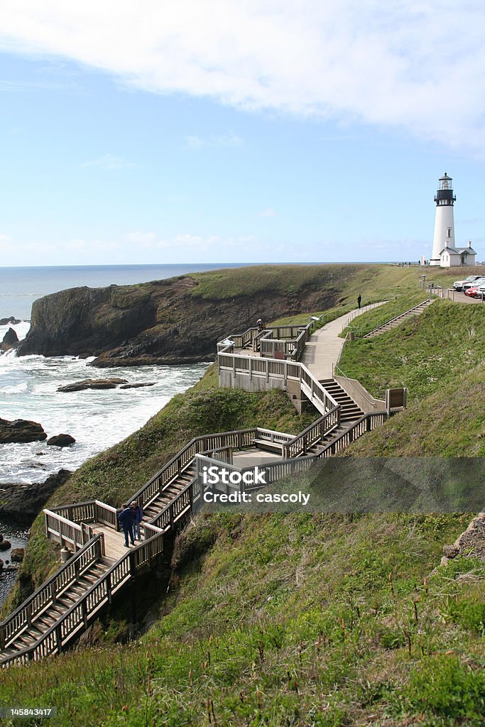 Wooden stairs to beach Wooden stairs to beach, misty day near Yaquina Head Lighthouse, Beach Stock Photo