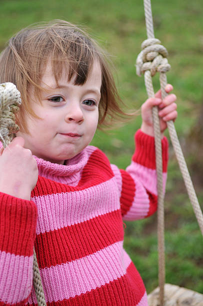 huśtać się - playground snow winter little girls zdjęcia i obrazy z banku zdjęć