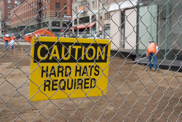 Caution sign at a construction site. stock photo