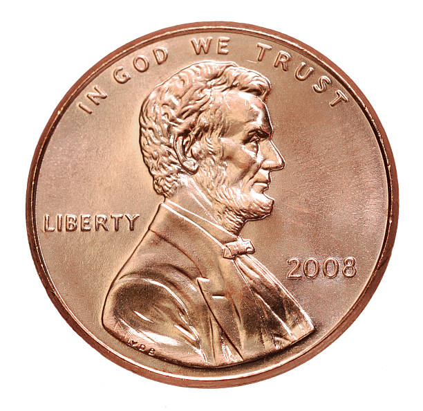 2008 penny with President Lincoln on a white background The smallest denomination US coin, with a nicely sculpted portrait of the great emancipator. us president photos stock pictures, royalty-free photos & images