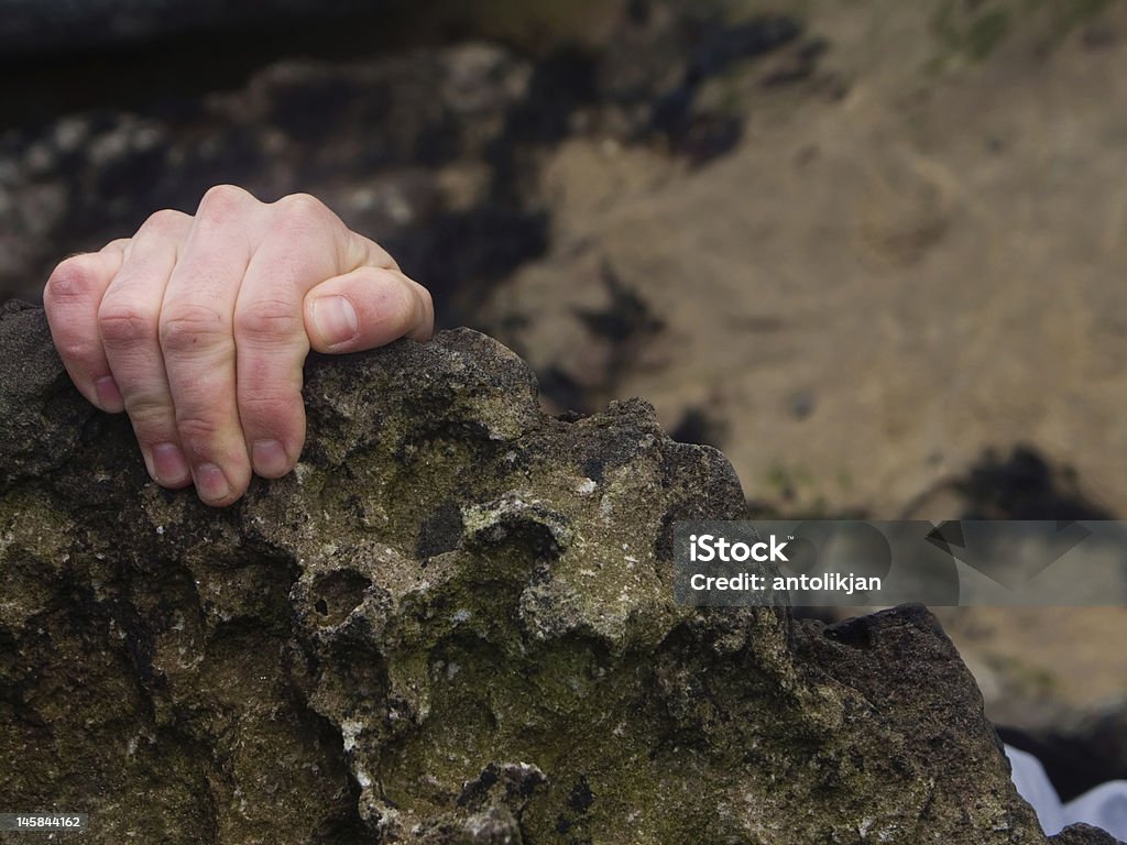 Scalare una roccia - Foto stock royalty-free di Alpinismo