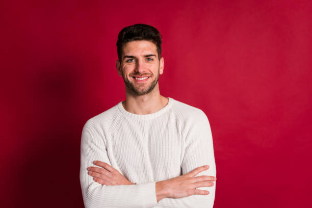 istock Positive young man with crossed arms 1458441648