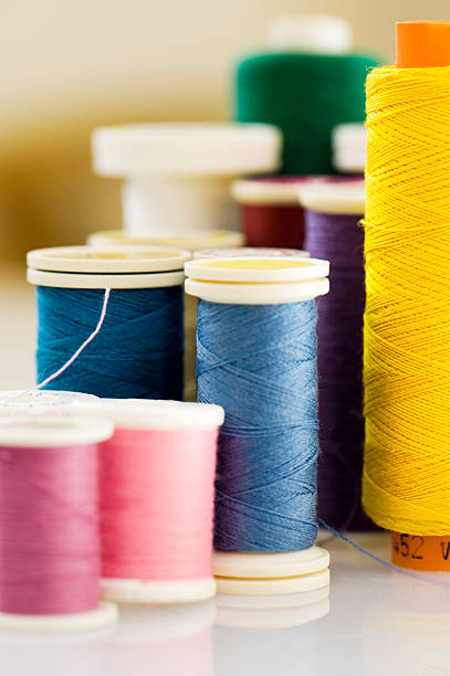 istock close up  different colors of thread. 145844203