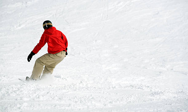 istock Snowboarder on snow. Lots  of space 145844707